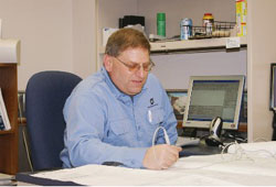 Mark Rebman at his desk