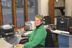 Mary Rebman at her desk